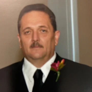 Hugh Tom Thomas_obit_profile
